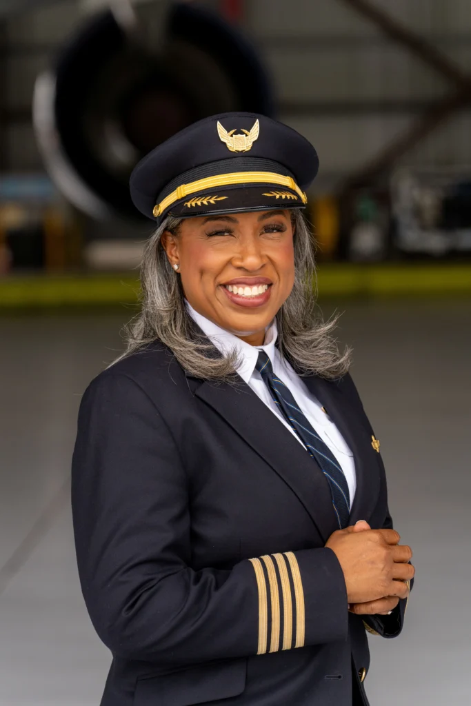 Captain Nia Gilliam in front of flight deck