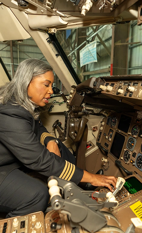Nia Gilliam airline captain in the cockpit